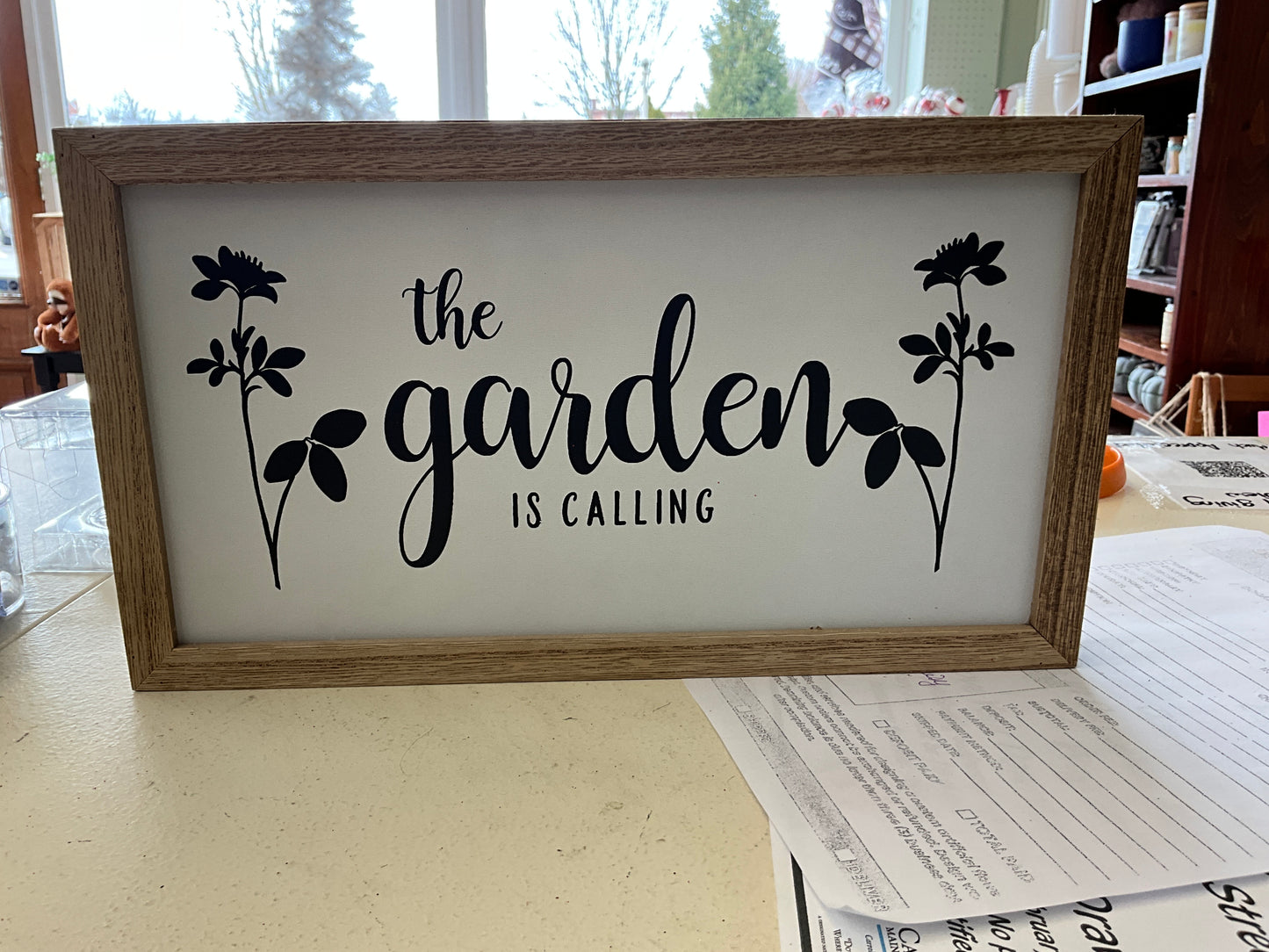 The Garden is calling wood sign