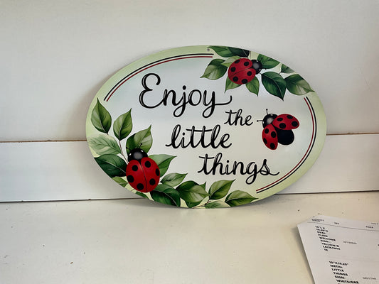 15”x10.25” metal little things sign