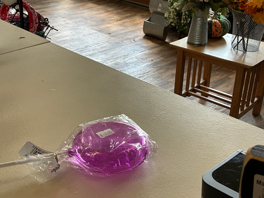 Pink plastic lollipop ￼