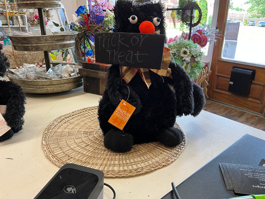 Black cat trick-or-treat sign