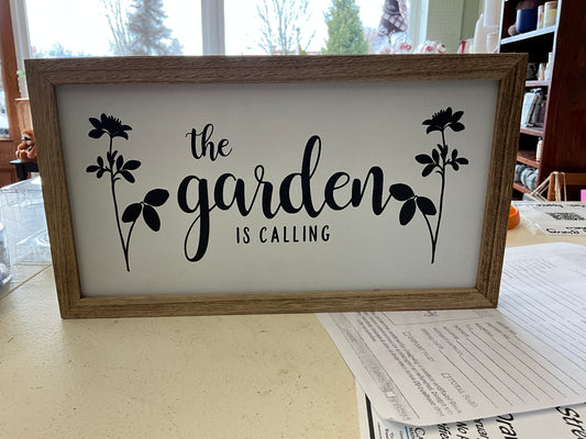 The Garden is calling wood sign
